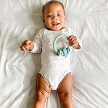 Ritzy Rattle™ Silicone Teether Rattles  | Highland Cow